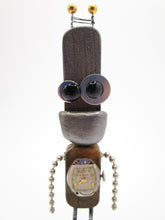 Wacky character small robot with antique clock face