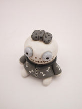 Halloween small cute skeleton girl in bone dress and bow