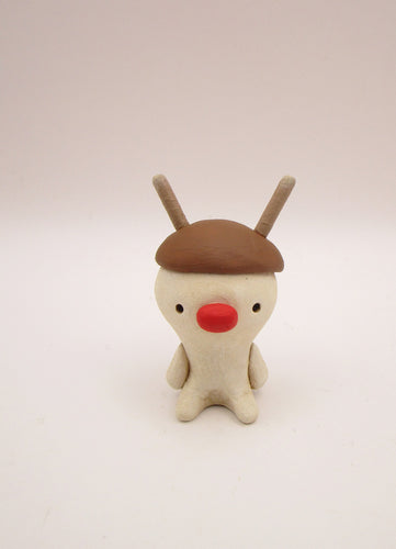 Little Christmas folk art snowman with reindeer hat