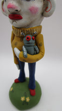 Pop art style MAN holding toy ROBOT misc