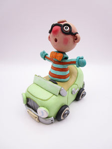 Wacky character man with glasses in car