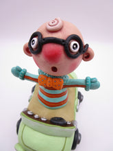 Wacky character man with glasses in car
