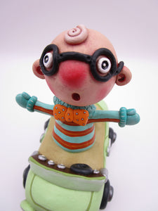 Wacky character man with glasses in car