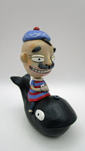 Man riding black whale with peeking conch great summer 4th of july folk art