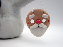 Christmas + Halloween folk art snowman with two masks