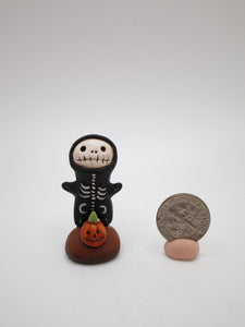 Halloween MINIATURE Skeleton figure wearing a black bone suit