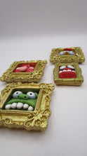 Mini Monsters in frames you get all four
