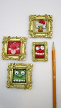 Mini Monsters in frames you get all four