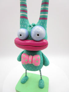 Monster dark teal wacky and cute with bow tie