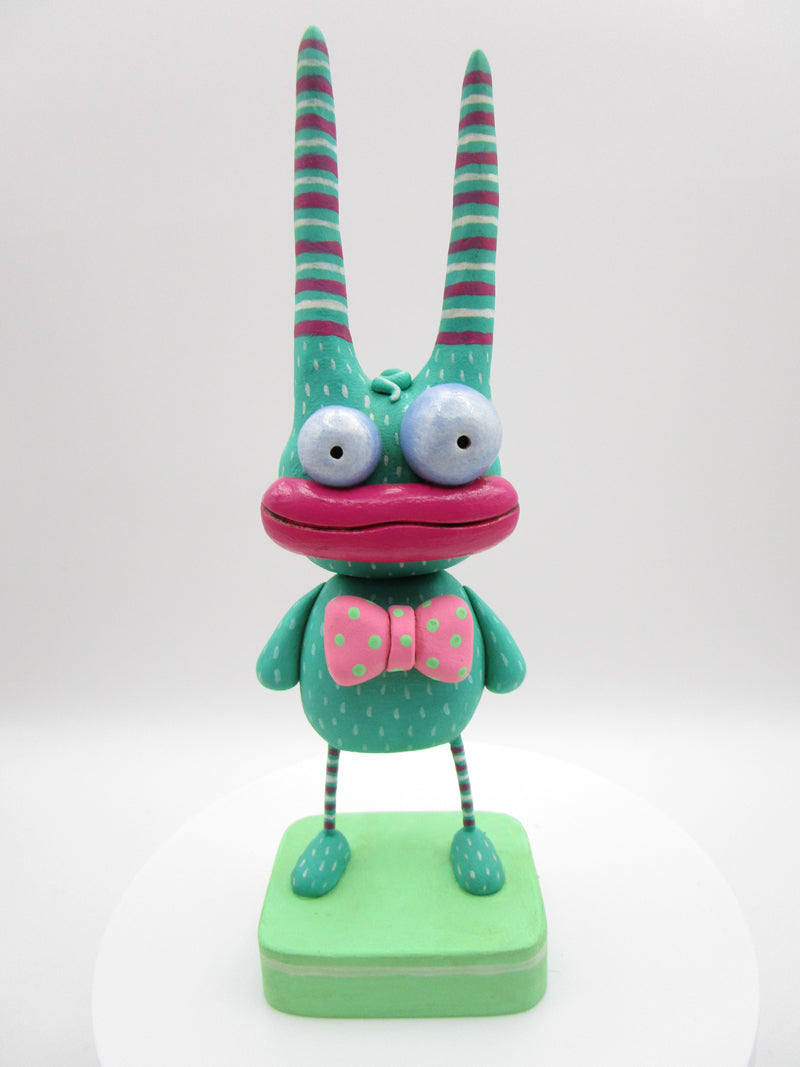 Monster dark teal wacky and cute with bow tie – pumpkinseeds folk
