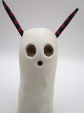 Halloween folk art spooky ghost with red and black horns