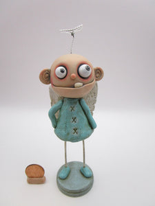 Christmas derelict misfit folk art angel with single tooth and fine crackle finish