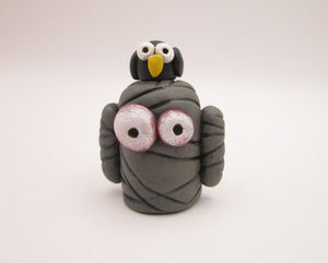 Halloween folk art small mummy man with owl on his head