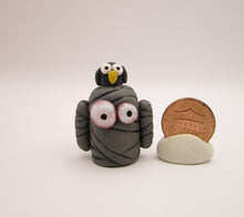 Halloween folk art small mummy man with owl on his head