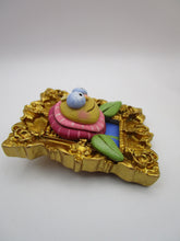Spring folk art PINK flower character in an ornate frame