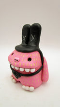 Easter folk art pink MONSTER wearing a black bunny hat