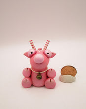 Christmas folk art small pink sitting reindeer