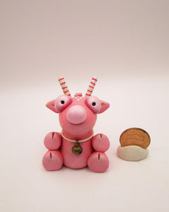 Christmas folk art small pink sitting reindeer