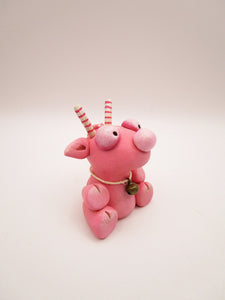 Christmas folk art small pink sitting reindeer
