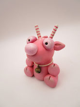 Christmas folk art small pink sitting reindeer