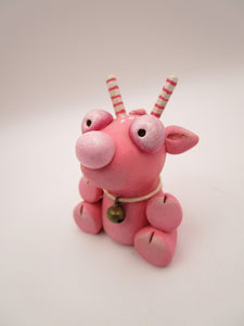 Christmas folk art small pink sitting reindeer