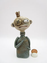 Primitive man with crown and lots of fine crackle and texture misc