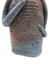 Primitive man with crown and lots of fine crackle and texture misc