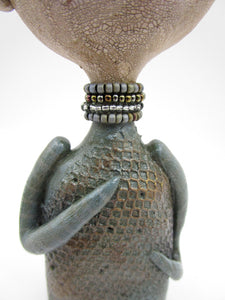 Primitive man with crown and lots of fine crackle and texture misc
