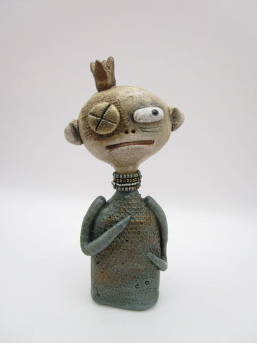 Primitive man with crown and lots of fine crackle and texture misc