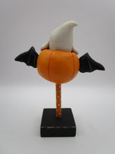 Halloween vintage style flying pumpkin with ghost rider