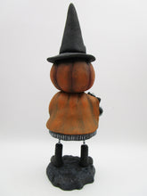 Halloween folk art pumpkin witch with black cat