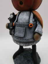 Halloween folk art pumpkin witch with black cat