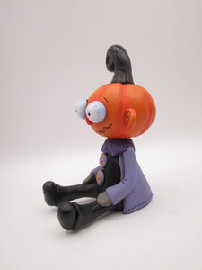 Halloween Pumpkin sitter with zig zag mouth and swirl ears