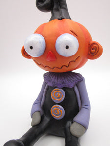 Halloween Pumpkin sitter with zig zag mouth and swirl ears