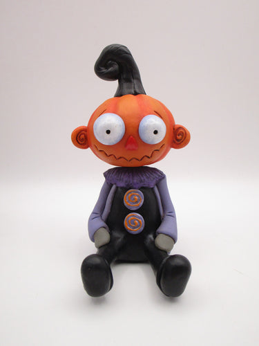 Halloween Pumpkin sitter with zig zag mouth and swirl ears