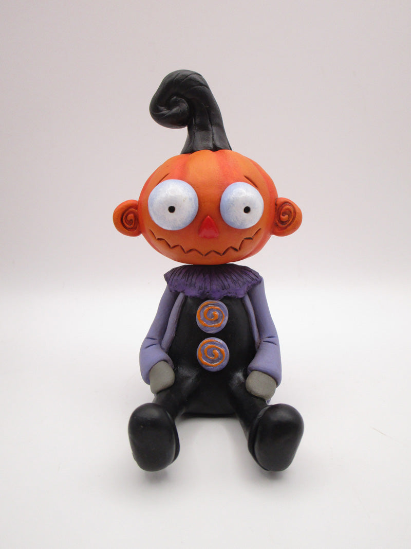 Halloween Pumpkin sitter with zig zag mouth and swirl ears