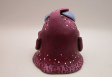 Monster purple blob with spiked teeth and hands