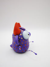Monster folk art little purple spotted monster with bendable arms and legs