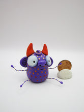 Monster folk art little purple spotted monster with bendable arms and legs