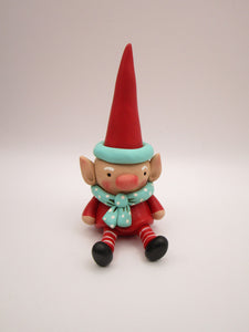 Christmas folk art sitting elf