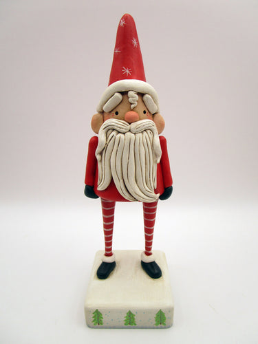 Christmas folk art red Santa with winded beard