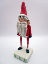 Christmas folk art red Santa with winded beard