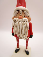Christmas folk art red Santa with winded beard