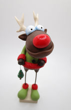 Christmas reindeer with Christmas tree charm