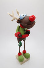 Christmas reindeer with Christmas tree charm