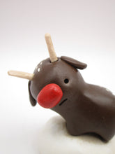 Christmas folk art brown reindeer standing with wood antlers