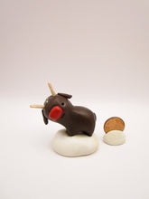 Christmas folk art brown reindeer standing with wood antlers