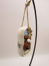 Christmas folk art ornament with reindeer character