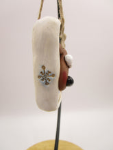 Christmas folk art ornament with reindeer character