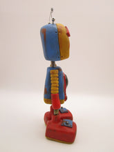 Robot Monster with metal heart and metal accents